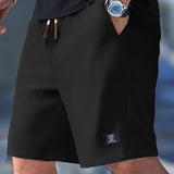 Pantaloncini slim fit con coulisse regolabile da uomo