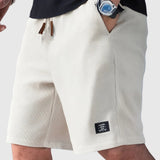 Pantaloncini slim fit con coulisse regolabile da uomo