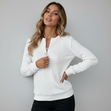 Maglione a treccia con zip al collo