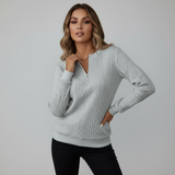 Maglione a treccia con zip al collo