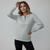 Maglione a treccia con zip al collo