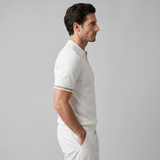 Polo a righe verticali con zip da uomo